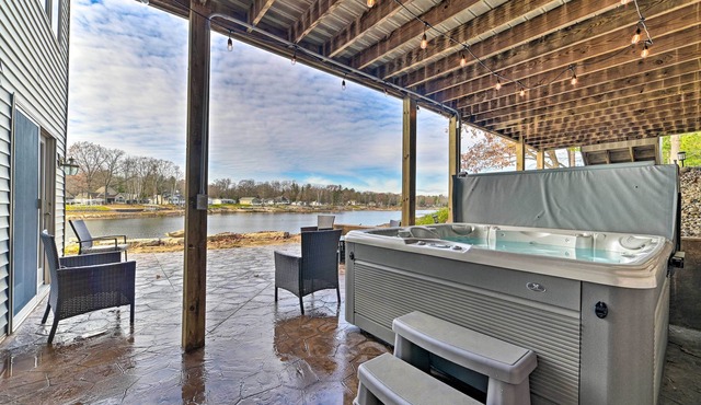 Lakefront Gladwin Home w/Private Beach & Hot Tub