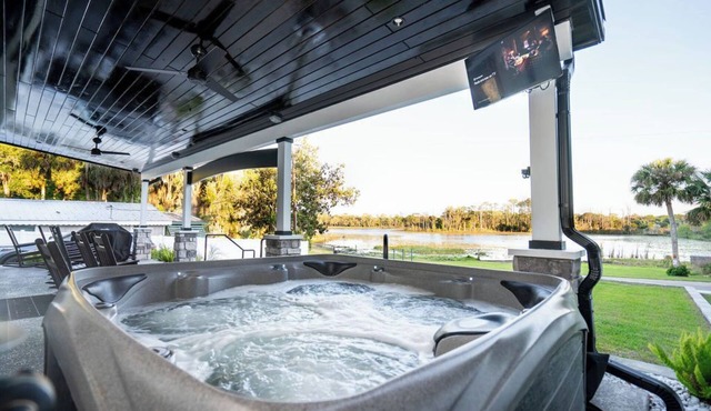 Lakefront Retreat w/Hot Tub, Arcade & Sunset Views