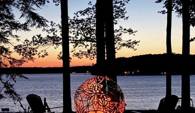 Long Lake Stone Cottage in Traverse City Frontage Kayaks Fire Pit Pet friendly