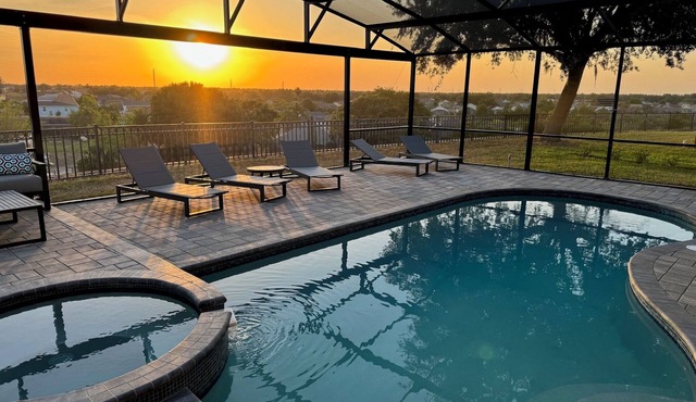 Modern villa with unique supersized private southwest pool deck close to Disney