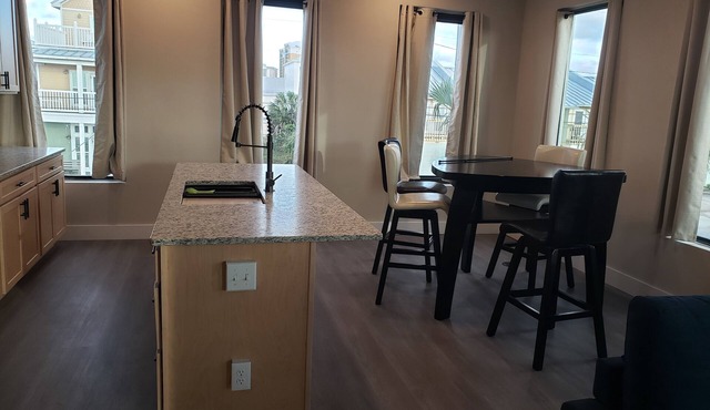 New Luxury 1BR Condo – Walk to the Beach