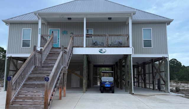 Perfect for your summer getaway. Quiet beach & pool just steps away.