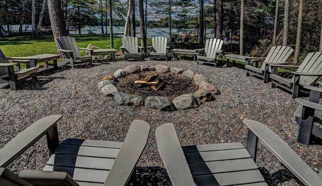 Plush lakefront lodge with private dock, high-speed WiFi, & game room