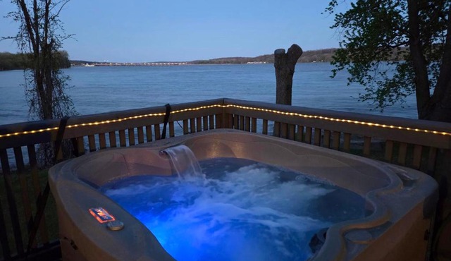 Private Riverfront Escape with Hot Tub, Fire Pit & Wildlife Views in Bettendorf