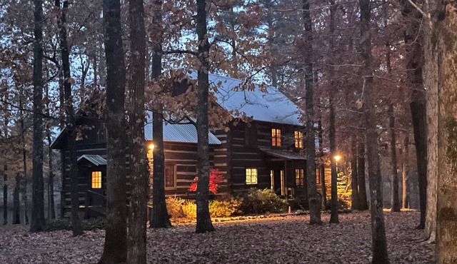 Prospect Mountain Cabin custom log home sportsman's paradise with fishing lake.
