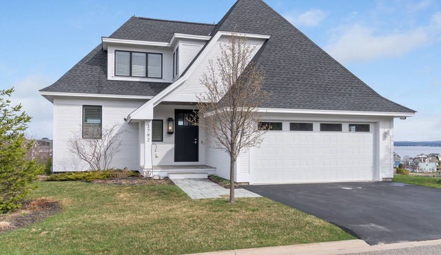 Ridge 3: A luxurious 4-bedroom retreat in Bay Harbor with stunning lake views.