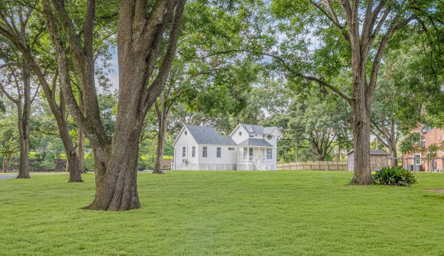 Romantic “Gingerbread” Cottage on the Vermillion River
