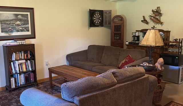 Rustic Log Home Basement with Trail Access – Ideal Snowmobiler’s Winter Retreat