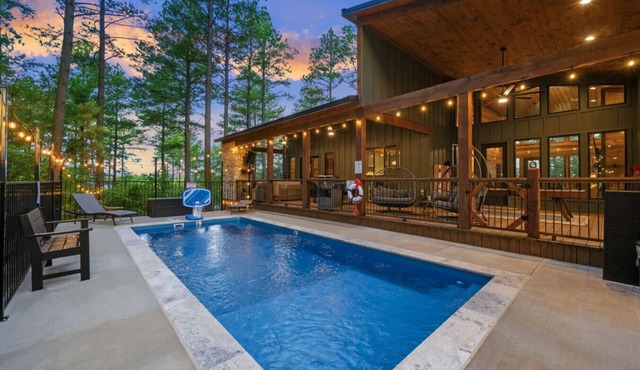 Sleeps 18 people with a private heated pool, hot tub, playground, fire pit, and a private arcade! in Broken Bow