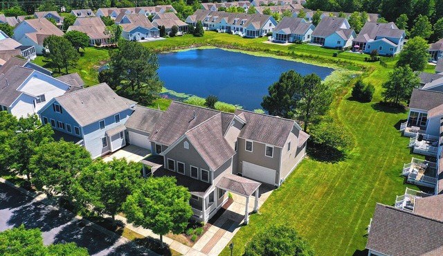 Sleeps 20 - Luxurious 7 bedroom home located in the Bear Trap Dunes Community. Excellent Amenities! Indoor & Outdoor Pool, Tennis Courts, Fitness Center, Shuttle to the Beach, Clubhouse, Wifi and more! in Ocean View