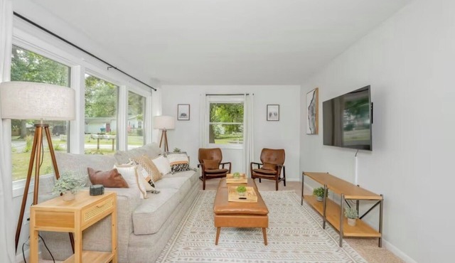 Spacious 4-bedroom house on Gun Lake with private hot tub.