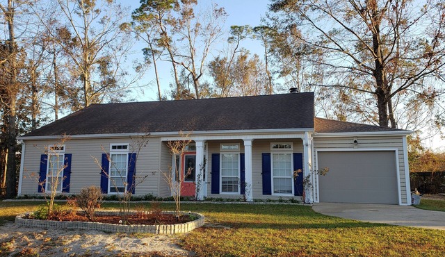 Walk to beach in minutes! Golf cart to town! Private deck for dining, fire pit!