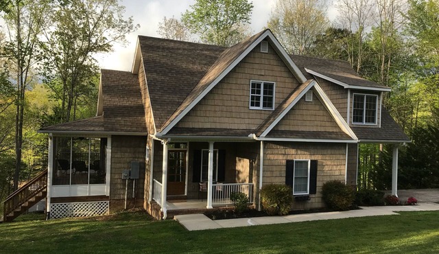 Waterfront home just steps away from a quiet cove and a 2 slip dock