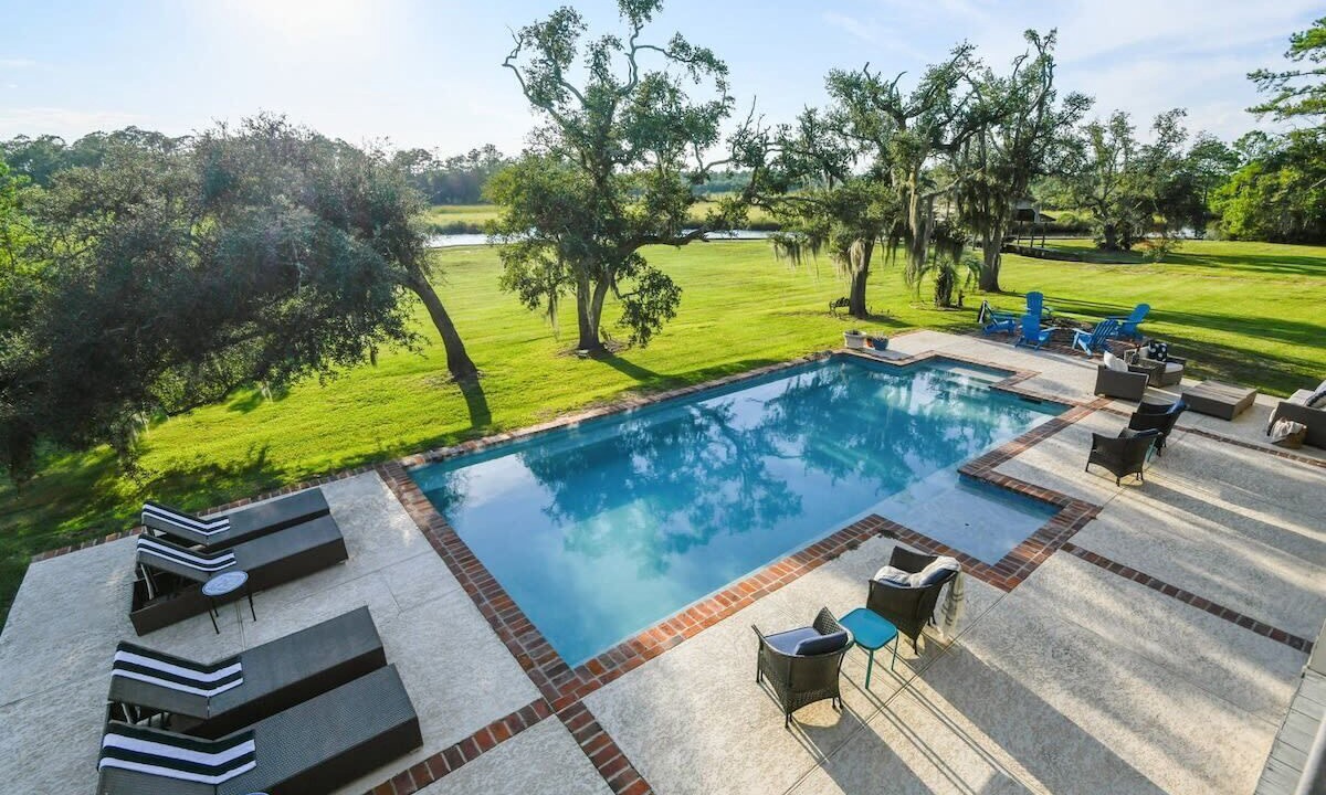 Shoreline Park House | Modern Bayou Home | Pool and Tennis Court