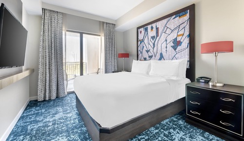 1 Bedroom King Suite with Sofa bed Hearing Accessible/ Tub