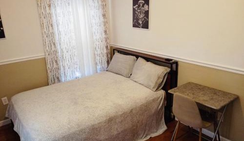 Queen Room with Shared Bathroom