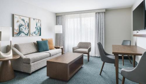Queen Suite with Two Queen Beds, Courtyard Access, Roll-In Shower, Transfer Shower and Sofa Bed - Mobility Access/Hearing Accessible
