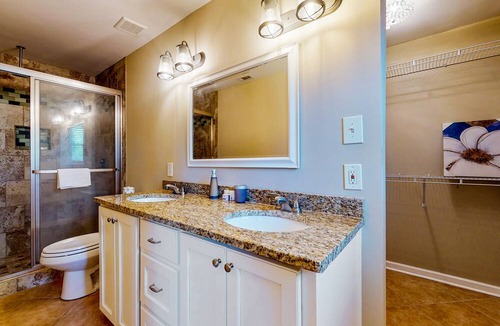 Isle of Hope Historic District House | Updated dog-friendly home with screened porch, children's items, & pellet grill