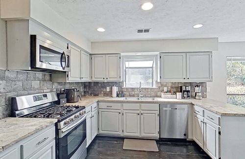 Gunter Afs House | Gorgeous pond view home with two porches, streaming, & W/D - great location