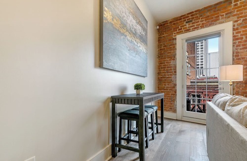 Arts/Warehouse District Apartment | 💜CHARACTER GALORE A TASTE OF NOLA NOT FOUND IN A HOTEL! 2 Balconies King Beds+Sleeper Sofa💜