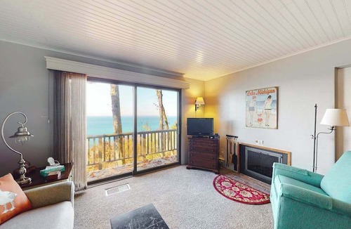 Maple City Condo | Tasteful Glen Arbor condo with beautiful Lake Michigan views, deck & fireplaces